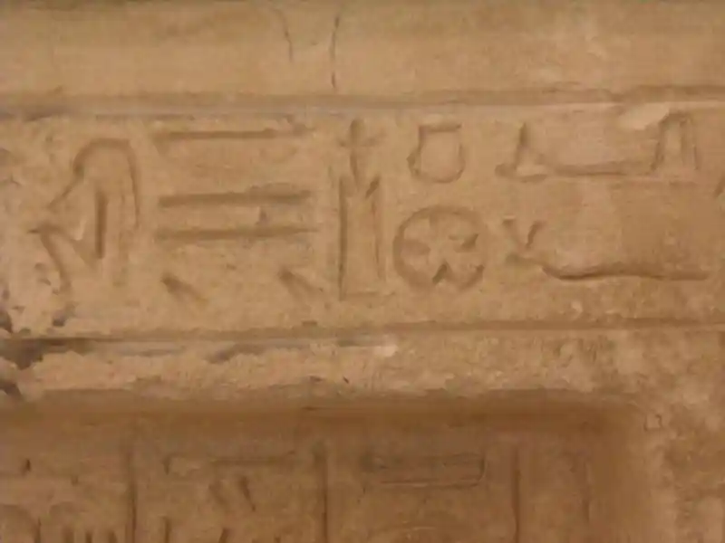 A cross without frame and a cross inside a circle symbols on a prechristian funerary stele